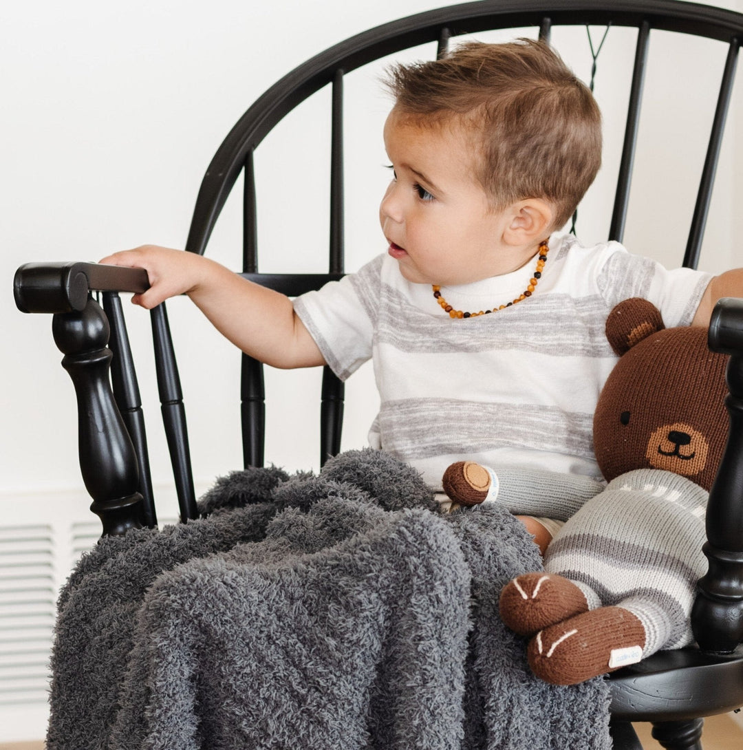 Charcoal Saranoni Ribbed BAMBONI¨ Mini Blanket surrounds your baby in ribbed texture and softness, ideal for baby blankets.