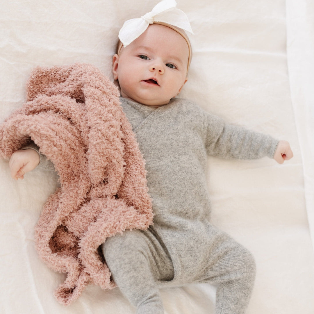 Every cuddle feels luxurious with the Saranoni Ribbed BAMBONI¨ Mini Blanket in Cameo, crafted for soft baby blankets.