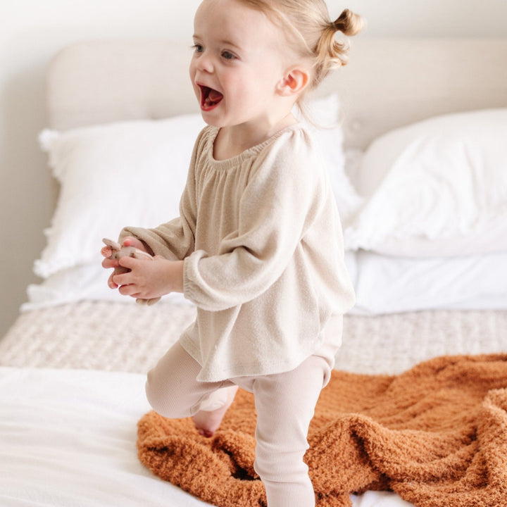 Ginger Saranoni Ribbed BAMBONI¨ Mini Blanket combines style and comfort, perfect as a baby boy blanket.