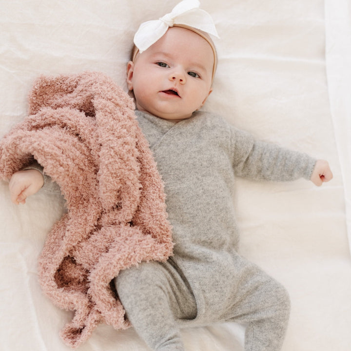 In Sun-Kissed, the Saranoni Ribbed BAMBONI¨ Mini Blanket delivers a cloud-soft feel, making it the ultimate baby blanket for snuggles.
