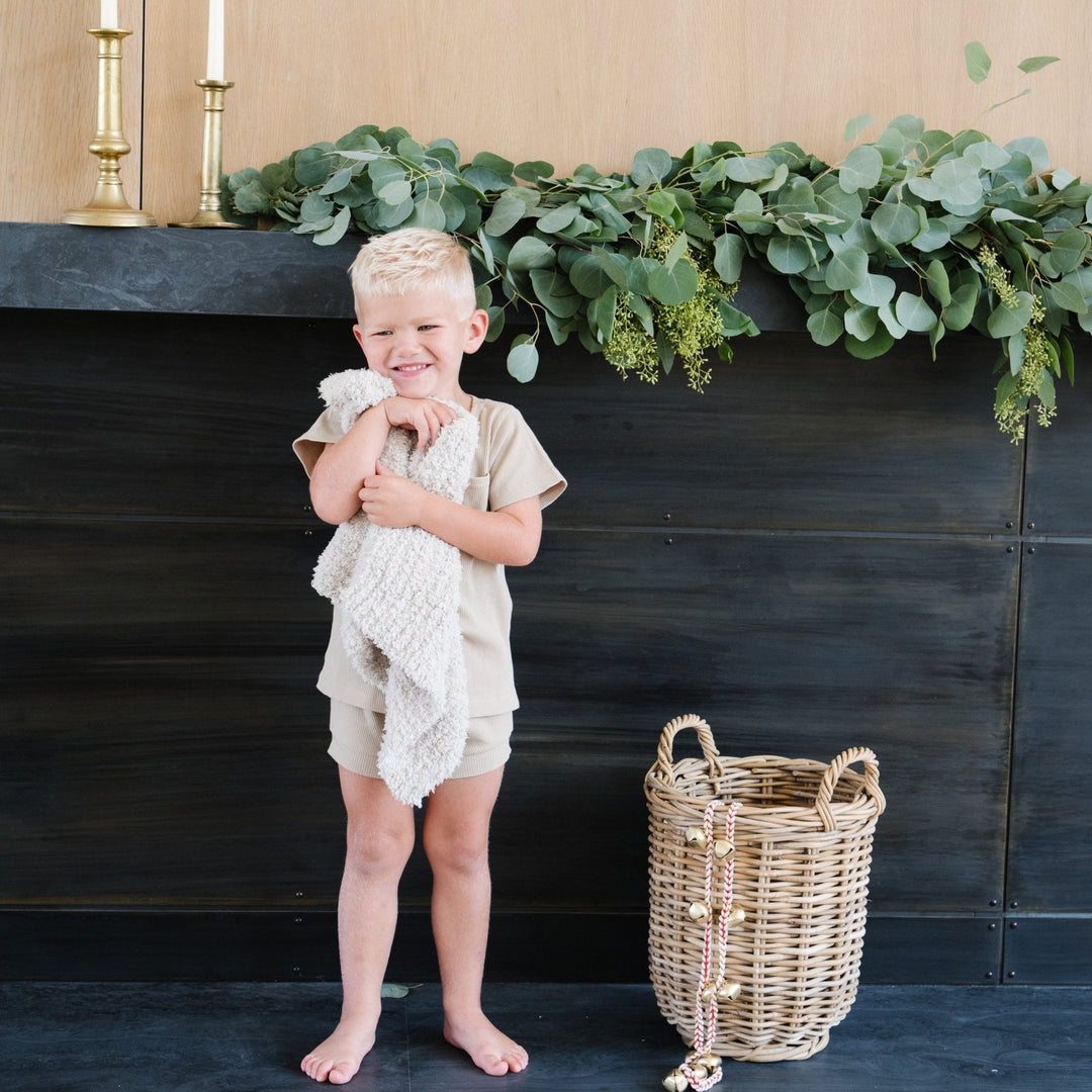 Saranoni Ribbed BAMBONI¨ Mini Blanket in Moonbeam offers featherlight comfort and timeless charm for baby boy blankets.