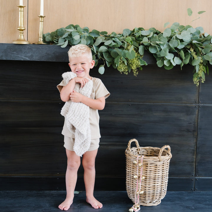 Saranoni Ribbed BAMBONI¨ Mini Blanket in Moonbeam offers featherlight comfort and timeless charm for baby boy blankets.