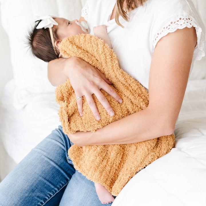 Designed in Golden, this Saranoni Ribbed BAMBONI¨ Mini Blanket offers unmatched softnessÑone of the best baby blankets.