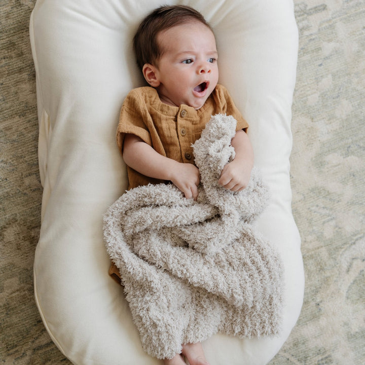Saranoni Ribbed BAMBONI¨ Mini Blanket in Moonbeam brings cozy softness, a must-have baby blanket for daily comfort.