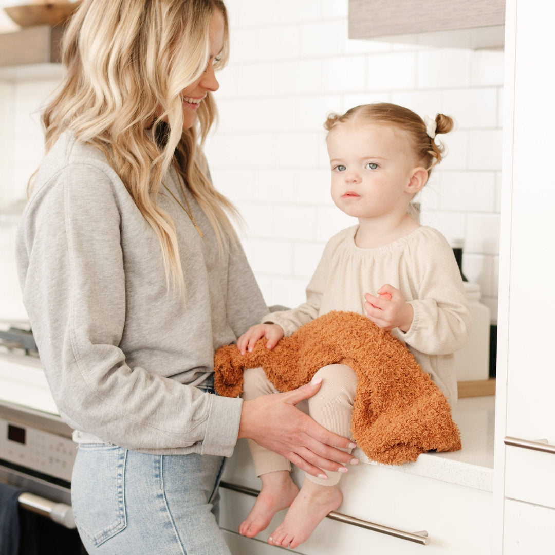 Wrap your little one in plush comfort with the Saranoni Ribbed BAMBONI¨ Mini Blanket in Ginger, a soft baby blanket favorite.