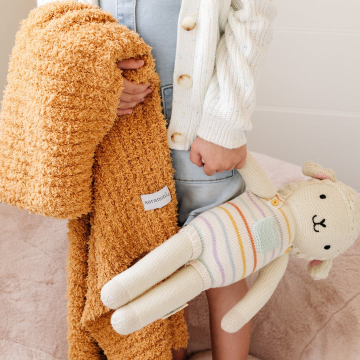 Softness meets simplicity with Golden Saranoni Ribbed BAMBONI¨ Receiving Blankets, perfect baby blankets.