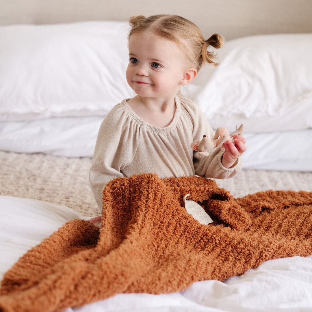 Saranoni Ribbed BAMBONI¨ Receiving Blanket in Ginger delivers cozy softness parents love in a Baby blanket.