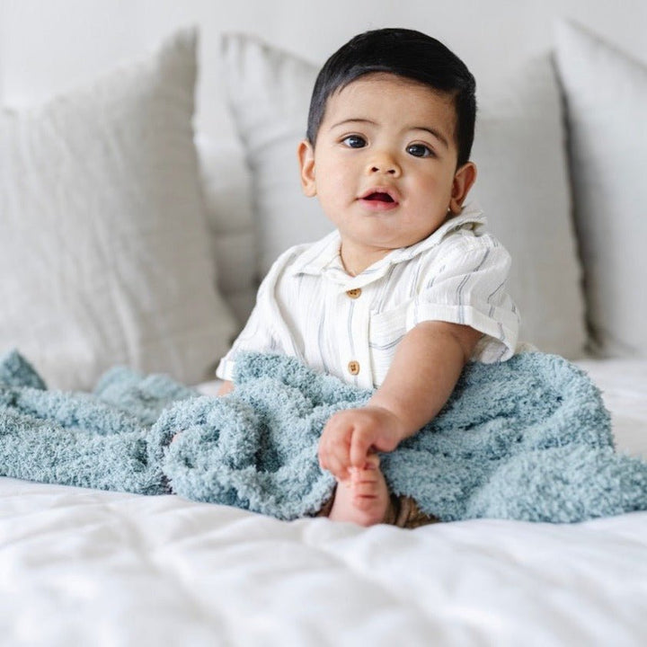 Warm and timeless, the Surf Saranoni Ribbed BAMBONI¨ Receiving Blankets elevate everyday baby blankets comfort.