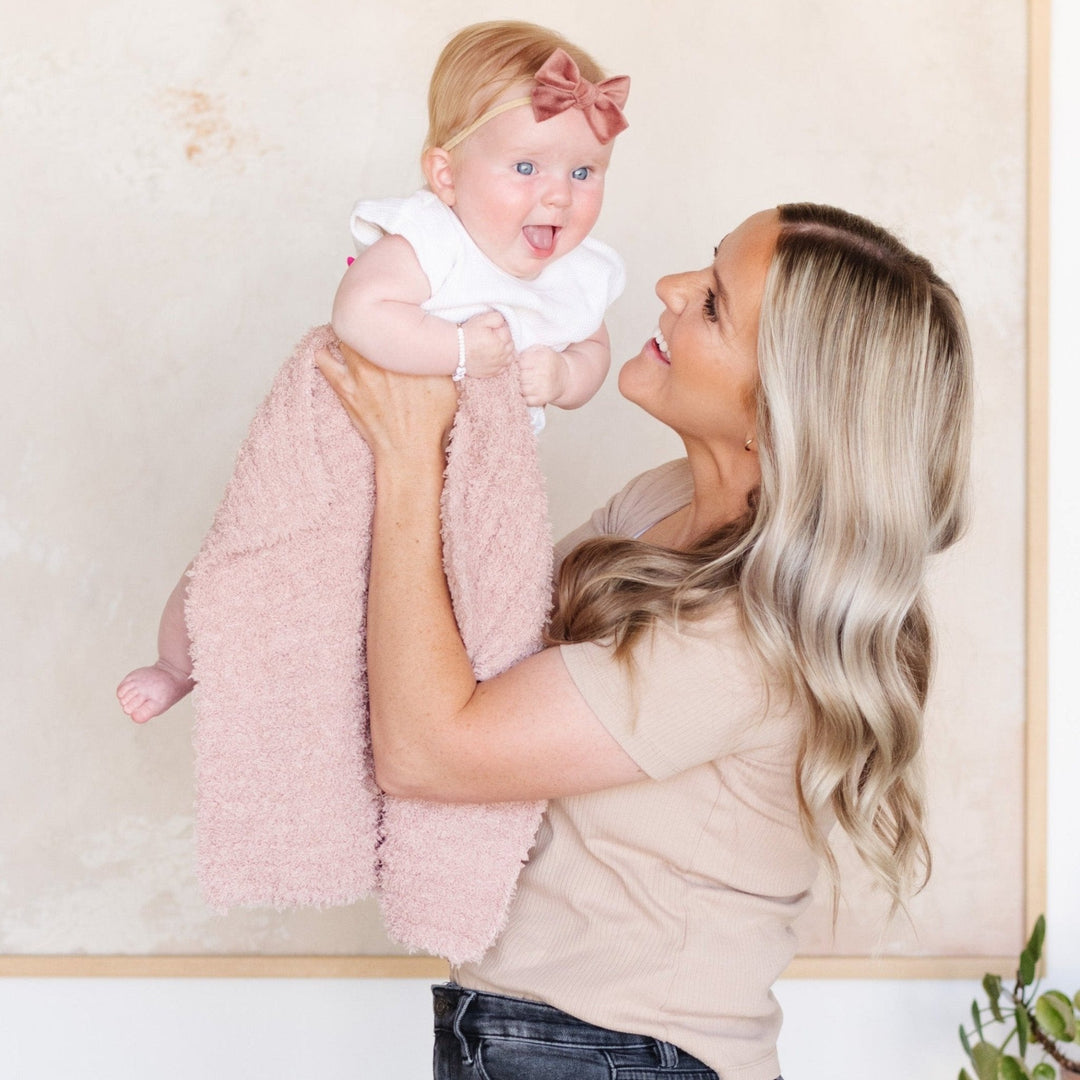 The Cameo Saranoni Ribbed BAMBONI¨ Receiving Blankets are an easy favorite pick for best baby blanket gifting.