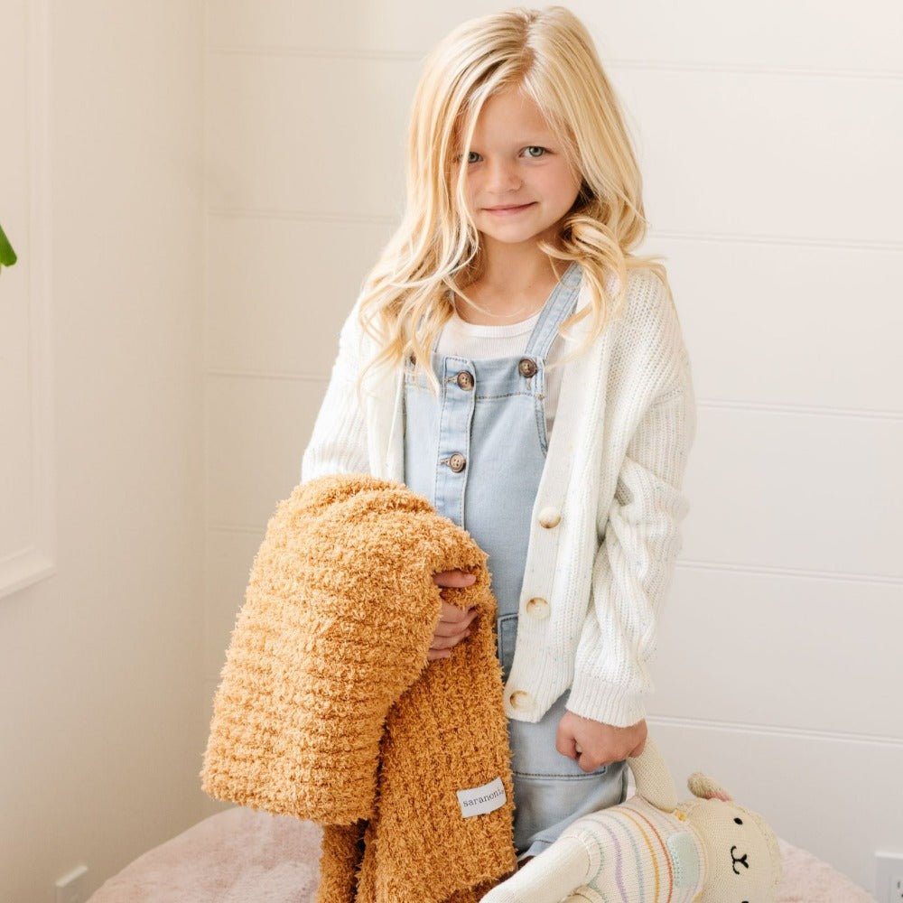 Designed to soothe, Golden Saranoni Ribbed BAMBONI¨ Receiving Blankets become a favorite baby boy blanket choice.