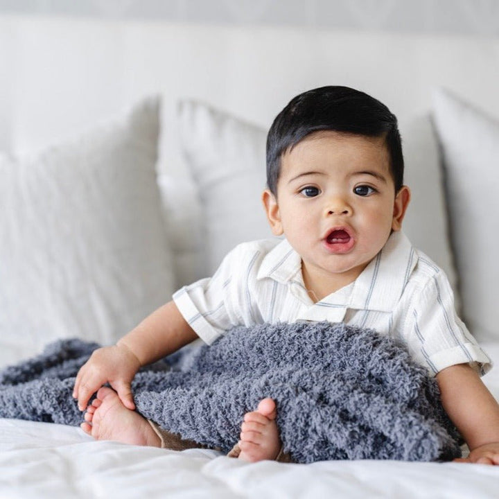 Parents love the Charcoal Saranoni Ribbed BAMBONI¨ Receiving Blanket for creating the coziest Best baby blanket experience.