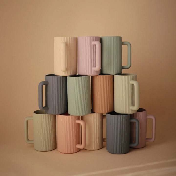 mushie rinse cups stacked