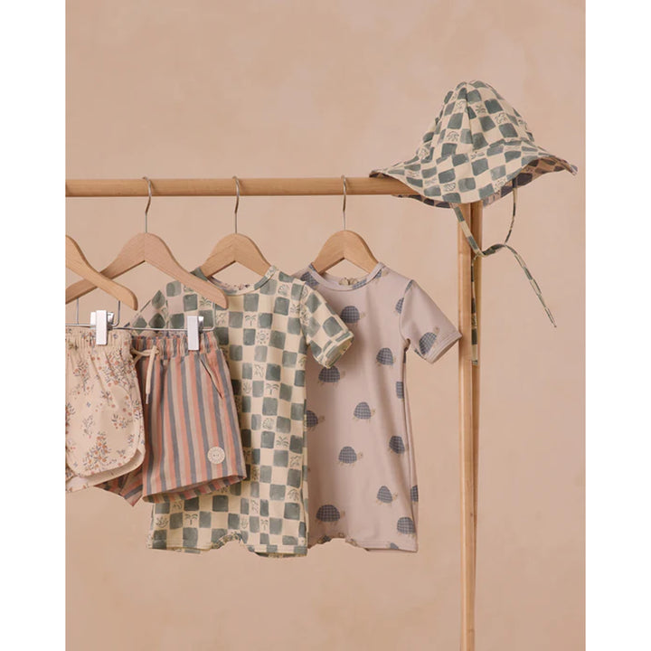 Rylee and cru floppy swim hat with blue and green check pattern perfect for family beach vacation