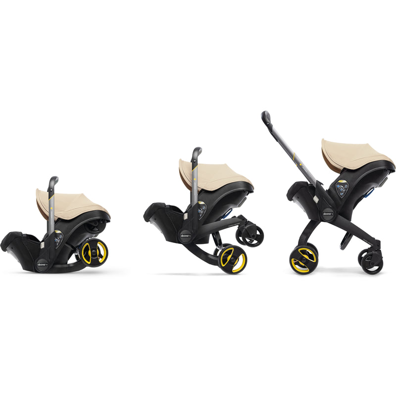 baby stroller with car seat from doona in beige