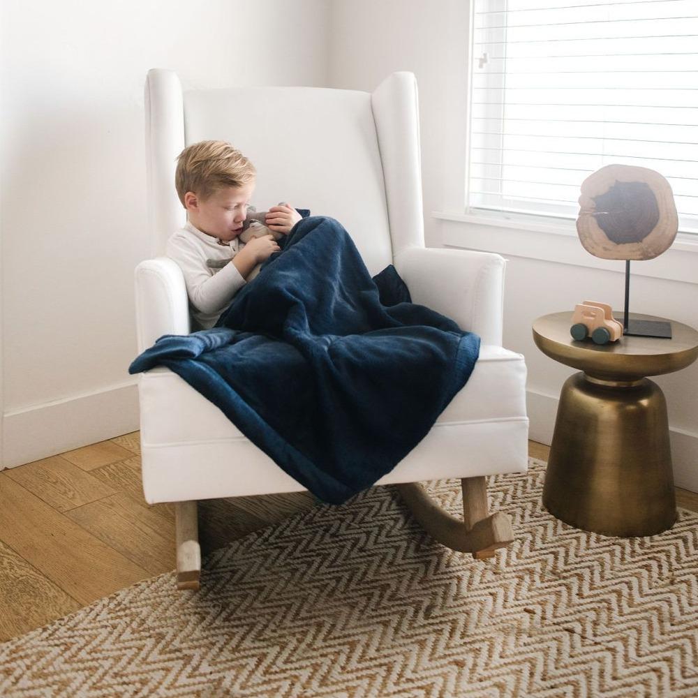Wrap your baby in Navy Lush Receiving Blanket by Saranoni, plush and comforting as a baby boy blanket.