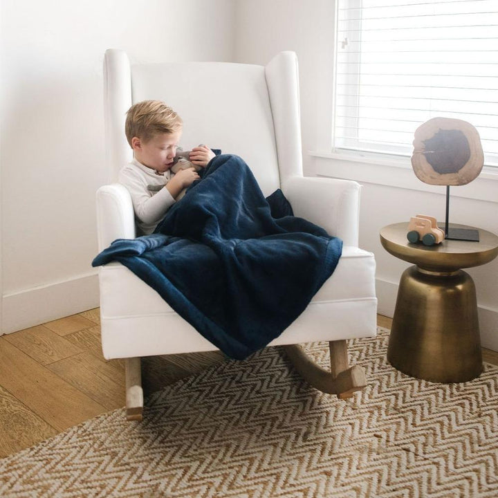 Wrap your baby in Navy Lush Receiving Blanket by Saranoni, plush and comforting as a baby boy blanket.