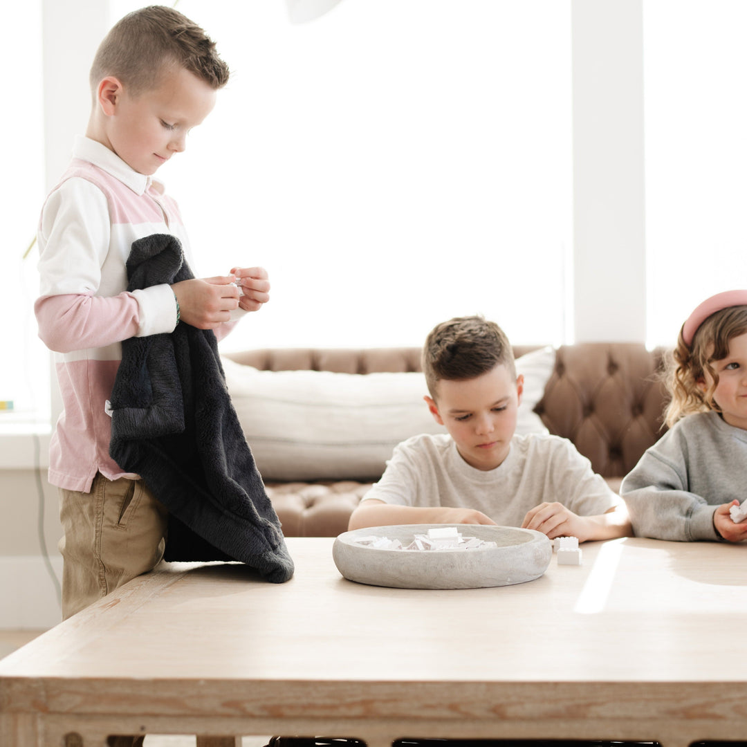 The Saranoni Lush Mini Blanket in Charcoal delivers rich plush softness and ranks among the Best baby blankets.