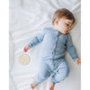 baby sleeping wearing Kyte Snap Romper in the color Slate
