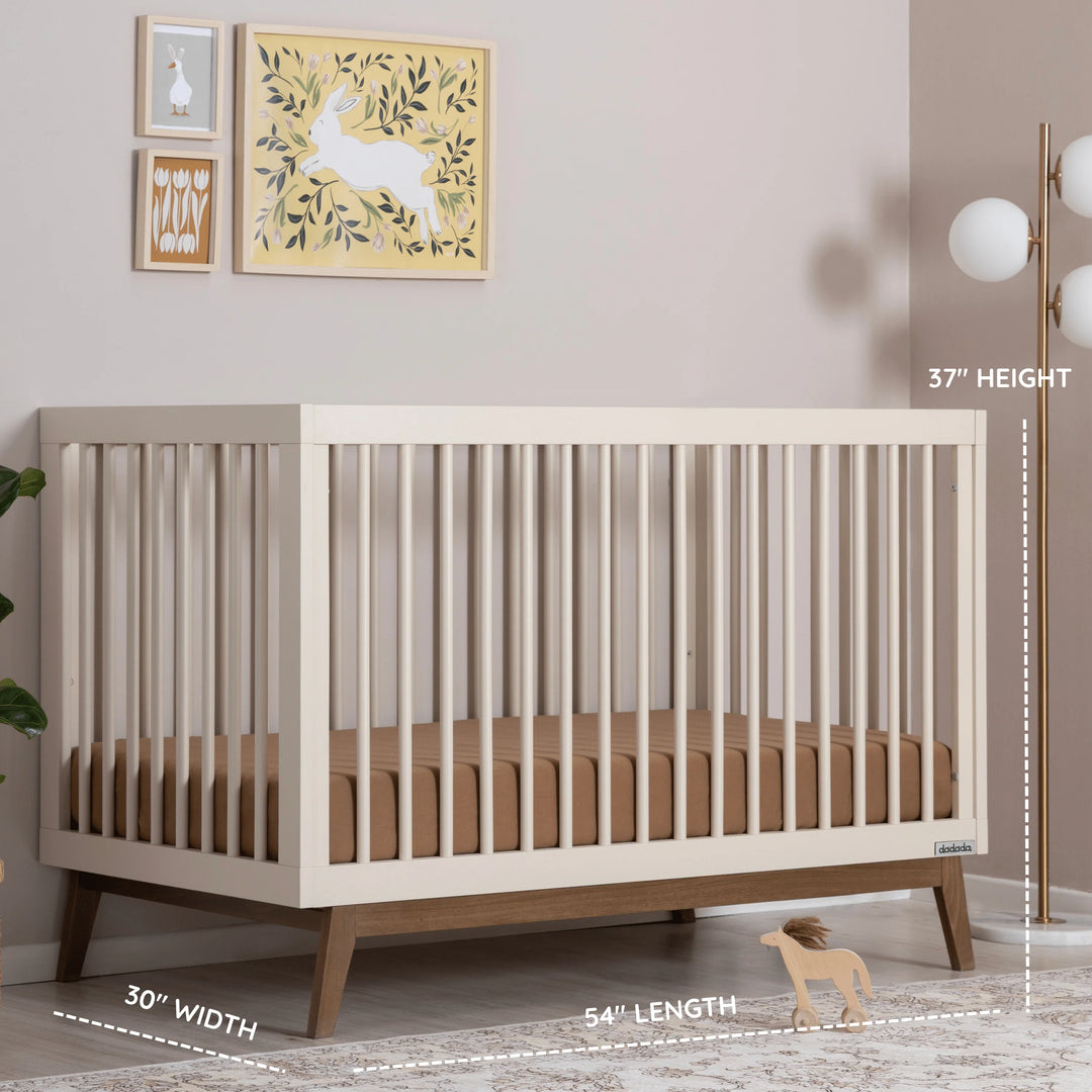 Warm almond milk and walnut Dadada Soho 3-in-1 Convertible Crib highlighted as a natural wood crib.