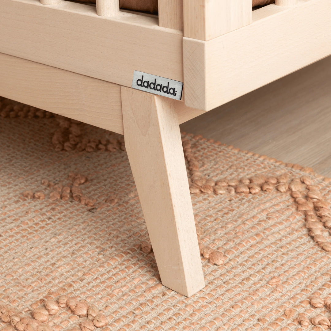 Classic style defines the Dadada Soho 3-in-1 Convertible Crib in Wash, a natural wood crib designed for modern nurseries.