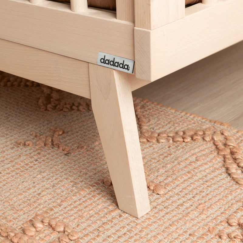 Classic style defines the Dadada Soho 3-in-1 Convertible Crib in Wash, a natural wood crib designed for modern nurseries.