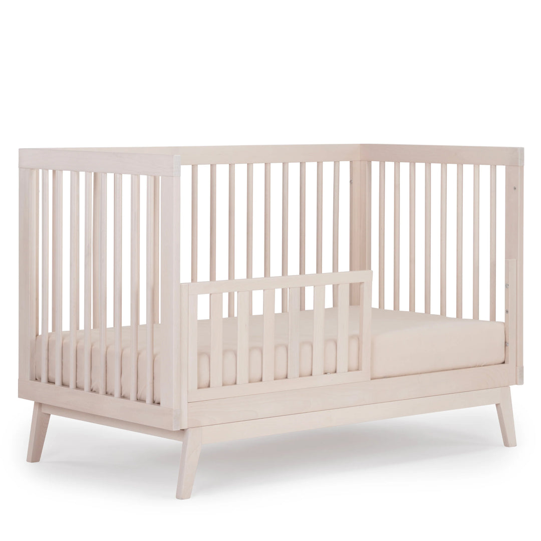 Beautifully crafted, the Dadada Soho 3-in-1 Convertible Crib in Wash offers a sleek baby crib look with timeless charm.