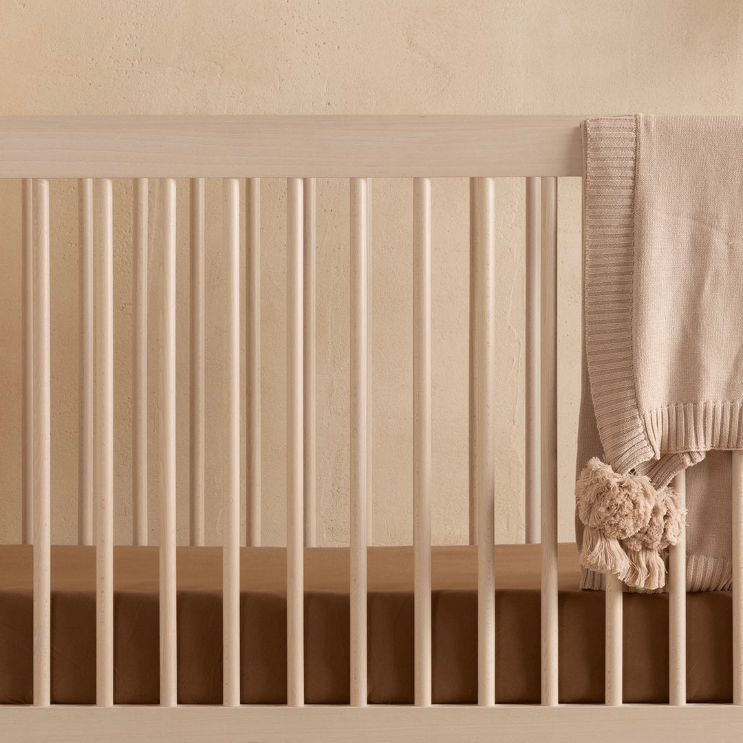 Clean lines highlight the Dadada Soho 3-in-1 Convertible Crib in Wash, an elegant convertible crib for growing families.