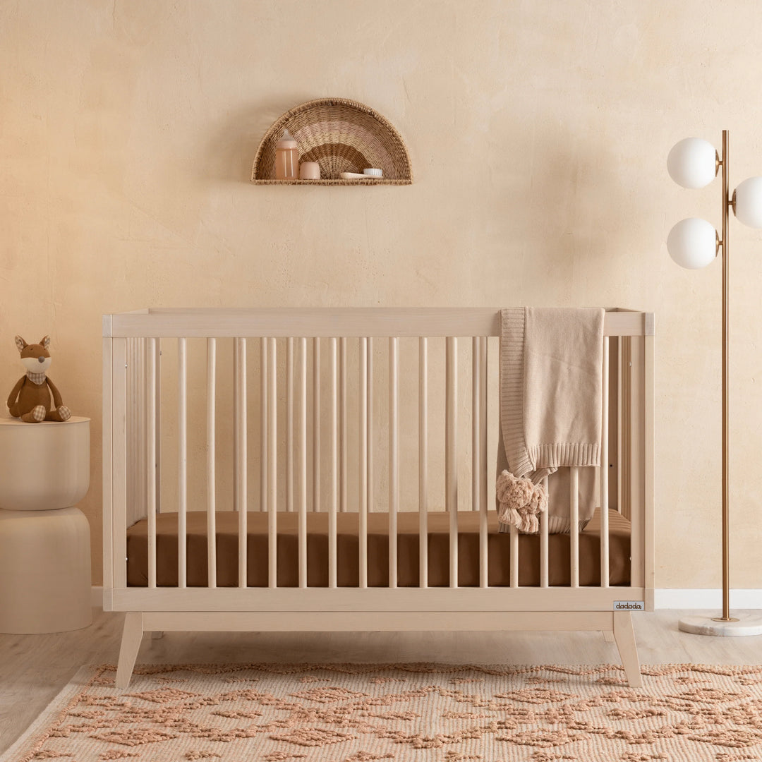 Modern nurseries shine with the Dadada Soho 3-in-1 Convertible Crib in Wash, a versatile 3 in 1 crib for babies.