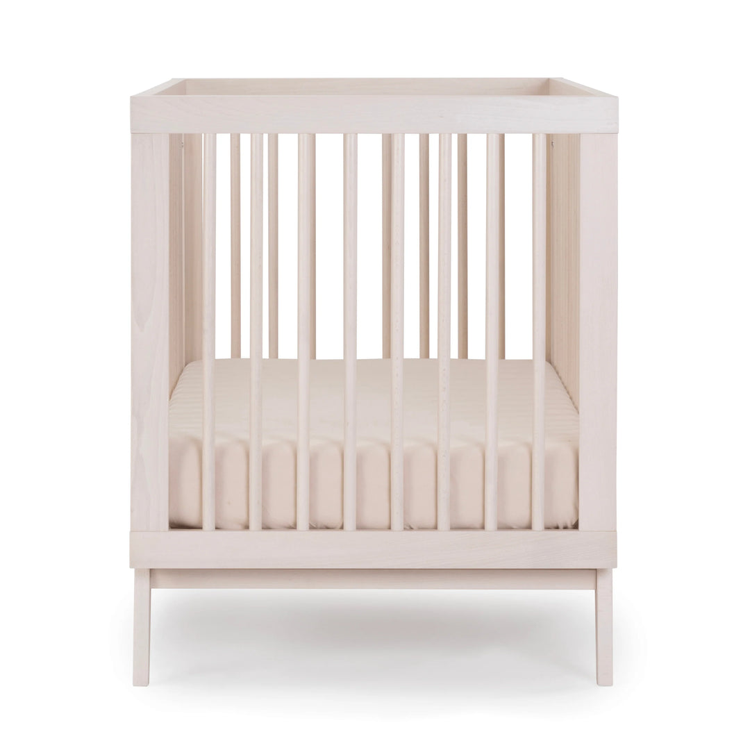 Timeless and practical, the Dadada Soho 3-in-1 Convertible Crib in Wash transforms from crib to toddler bed with ease.