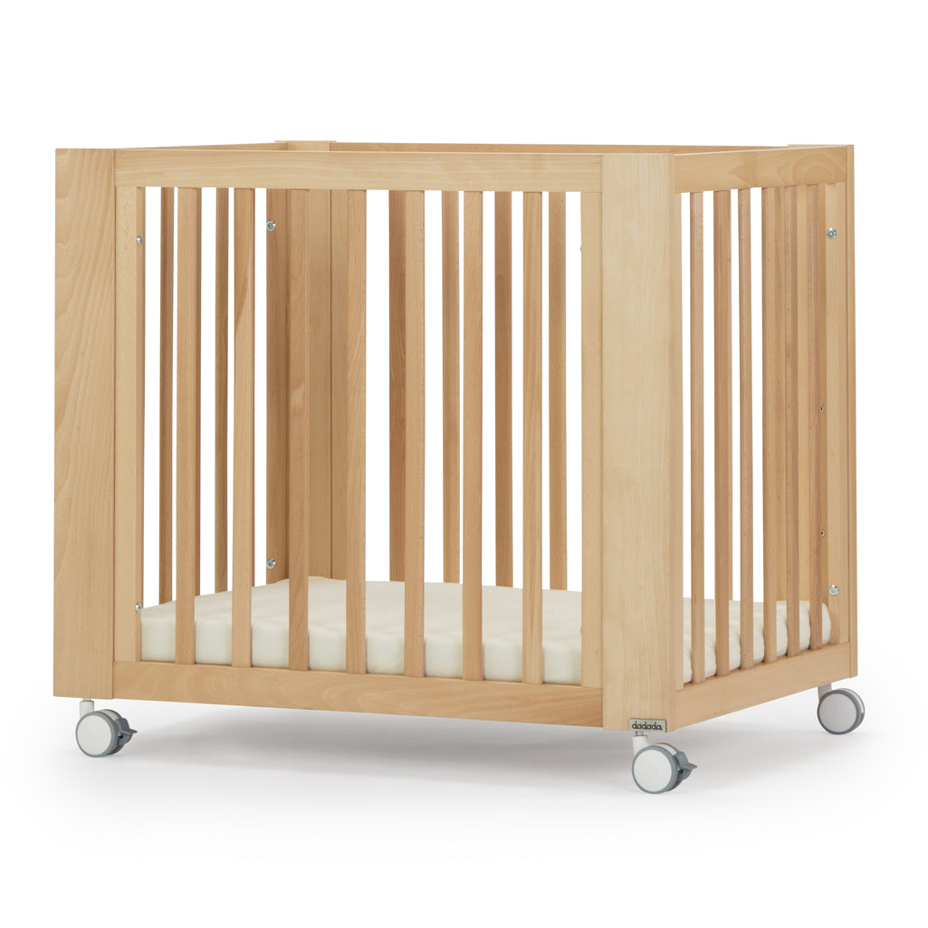 dadada spirit 8-in-1 convertible mini crib natural