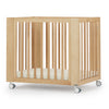 dadada spirit 8-in-1 convertible mini crib natural