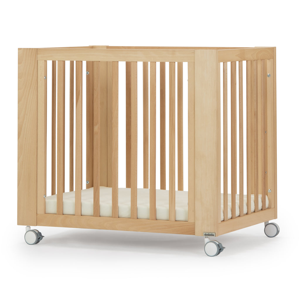 dadada spirit 8-in-1 convertible mini crib natural