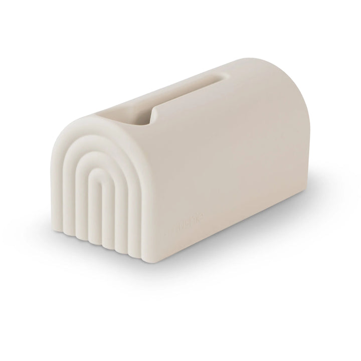 Mushie Spout Cover Shifting Sand A shifting sand-colored spout cover for added bath time safety designed to protect toddlers from hard faucets