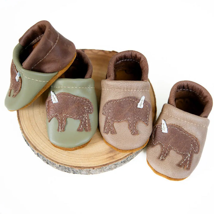 chai and lichen handcrafted leather baby moccosans with bison detail and adjustable back for flexible baby foot fit by starry knight design