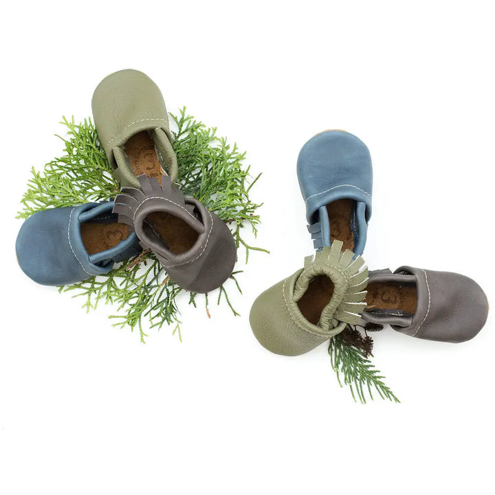 navy blue, lichen green, and stone gray infant and toddler leather baby shoes handcrafted in montana by starry knightdesign 