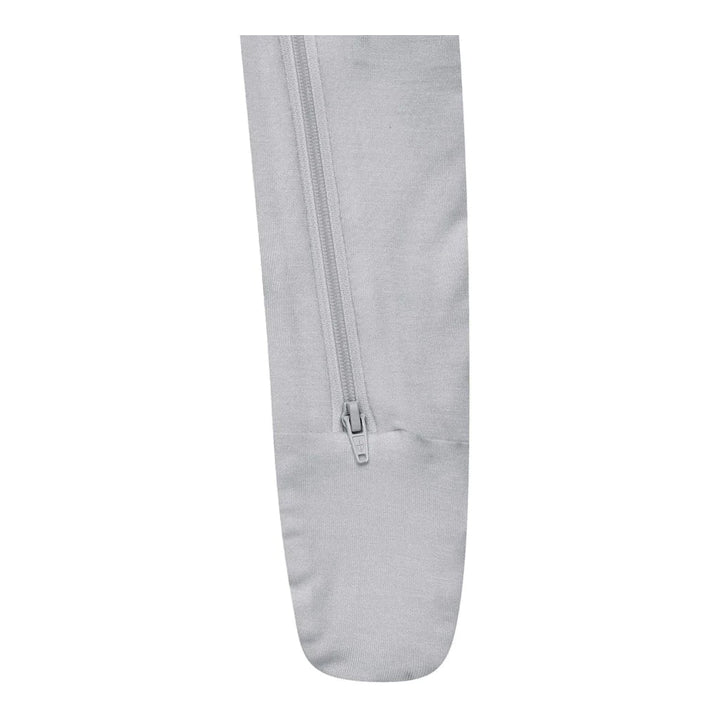 The Storm Kyte Baby Footie wraps your baby in cozy bamboo fabric for all-night comfort.