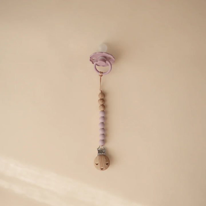 Mushie EVA Newborn Pacifiers Clip in Mauve perfect for keeping pacifiers secure and accessible