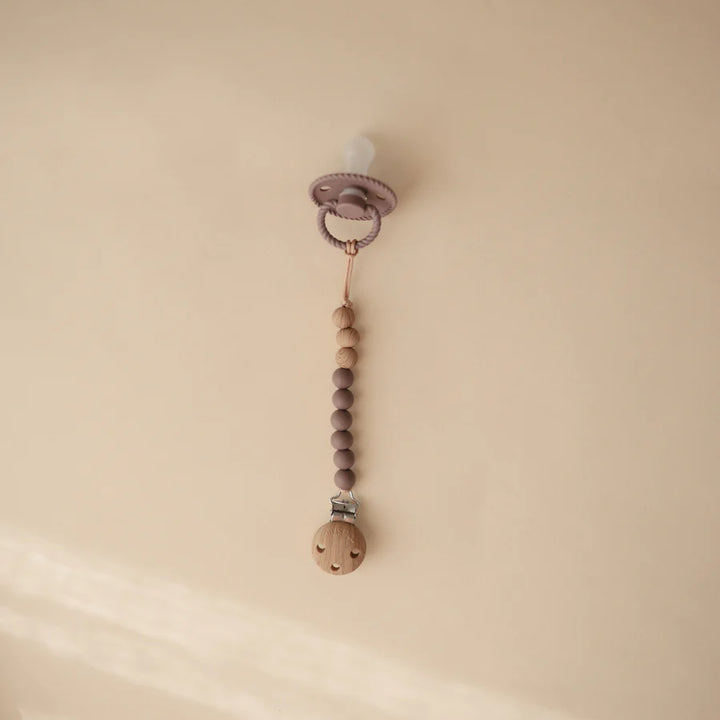 Mushie EVA Pacifier Clip in Ash a durable and stylish solution for keeping your baby's pacifier clean