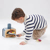toddler roleplaying kitchen toys