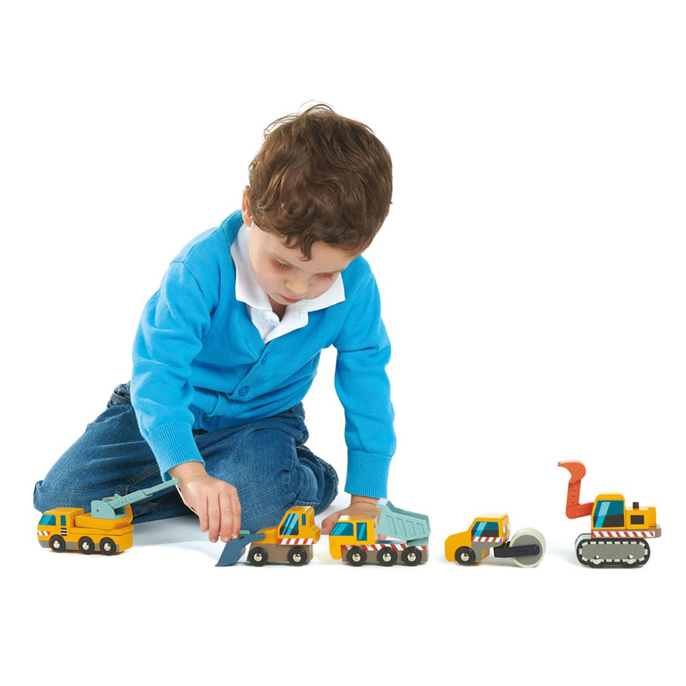 Wooden construction toy cars by Tenderleaf, designed for creative play.