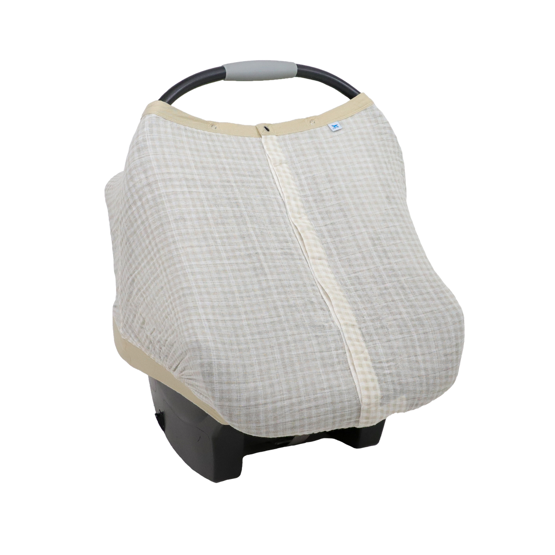 Little Unicorn Cotton Muslin Car Seat Canopy - Tan Gingham shown in a warm checkered print, perfect for stylish car seat canopy protection.