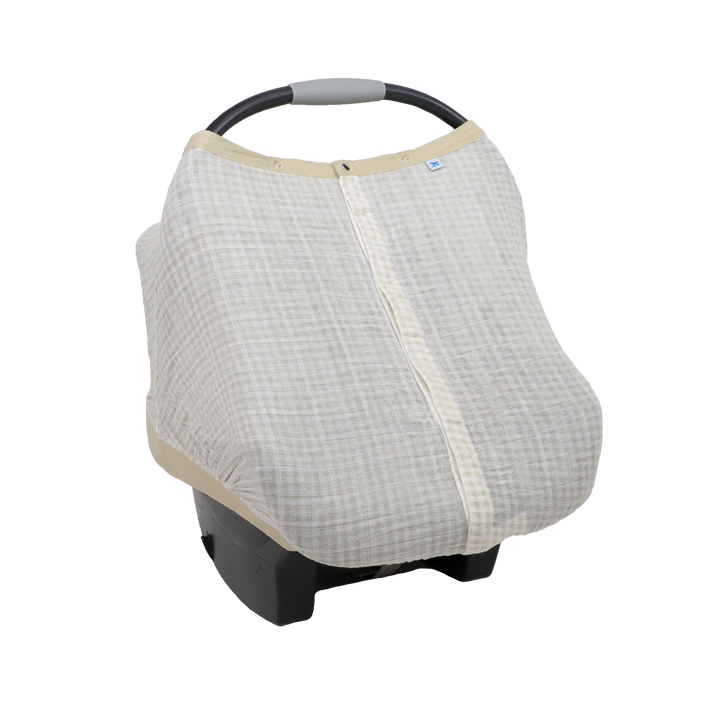 Little Unicorn Cotton Muslin Car Seat Canopy - Tan Gingham shown in a warm checkered print, perfect for stylish car seat canopy protection.