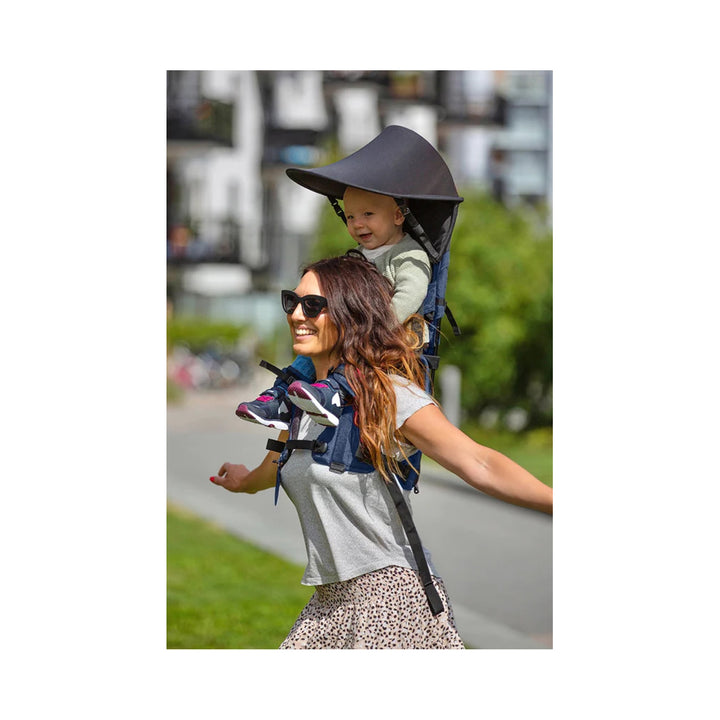 Happy baby using the sunshade