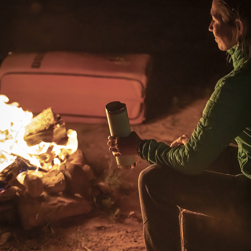 Bonfire scene with Tofu Klean Kanteen 20oz TKWide with Cafe Cap, chip resistant finish for durability.