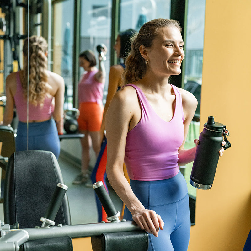 Lifestyle image of Black Klean Kanteen 32oz TKWide with Chug Cap, leak proof and ideal for gym use.