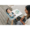 toddler eating from uppababy cirro high chair