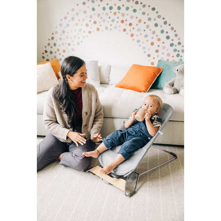 toddler in uppababy toddler seat bouncer