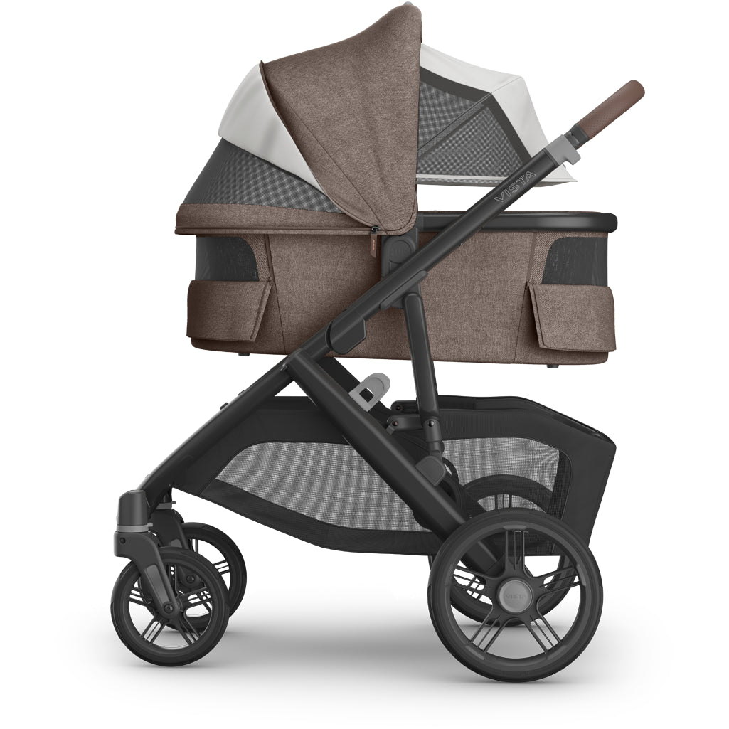 Uppababy Vista V3 Stroller + Bassinet V3 in Owen shown from side, stylish stroller for newborn and infant comfort.
