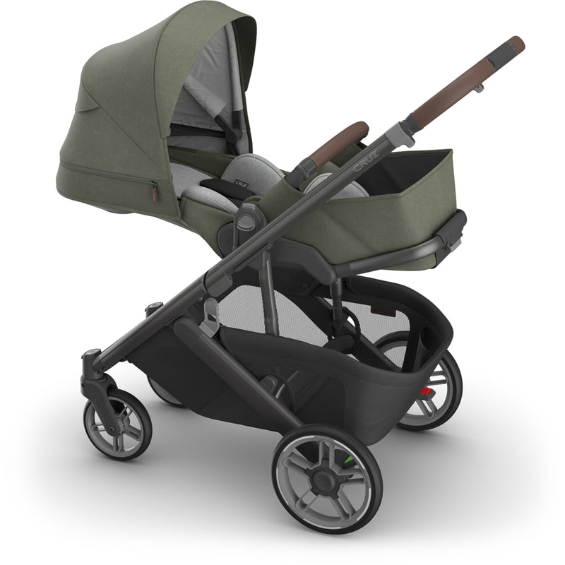 Compact folded uppa baby  Cruz V3 Stroller Evelyn, demonstrating one handed fold and space-saving design