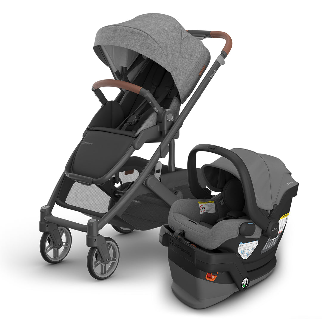 Greyson Cruz V3 and matching Mesa V3 by UPPAbaby shown as a complete infant travel system in grey fabric.